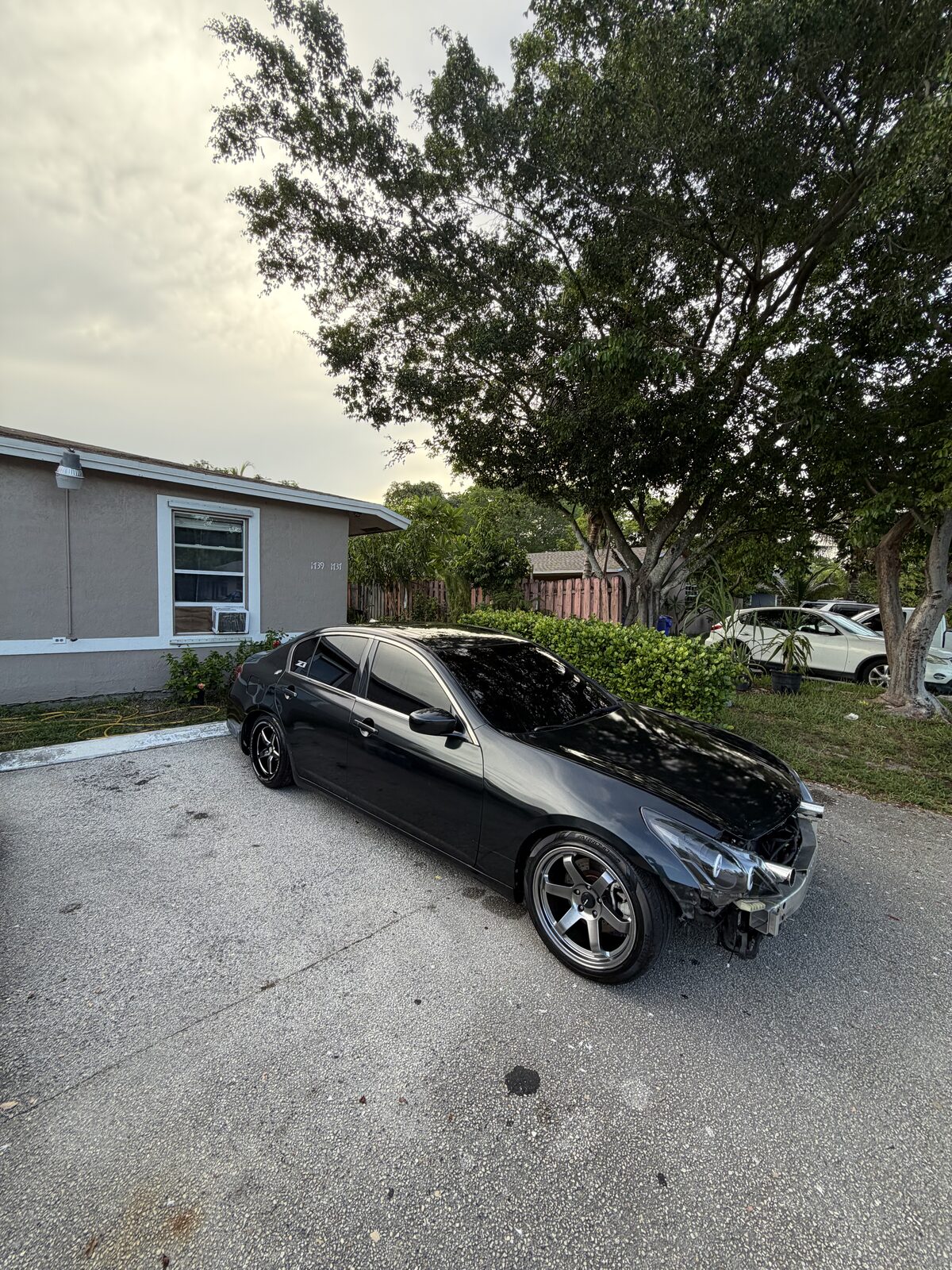 Black sedan — exterior wash complete, South Florida